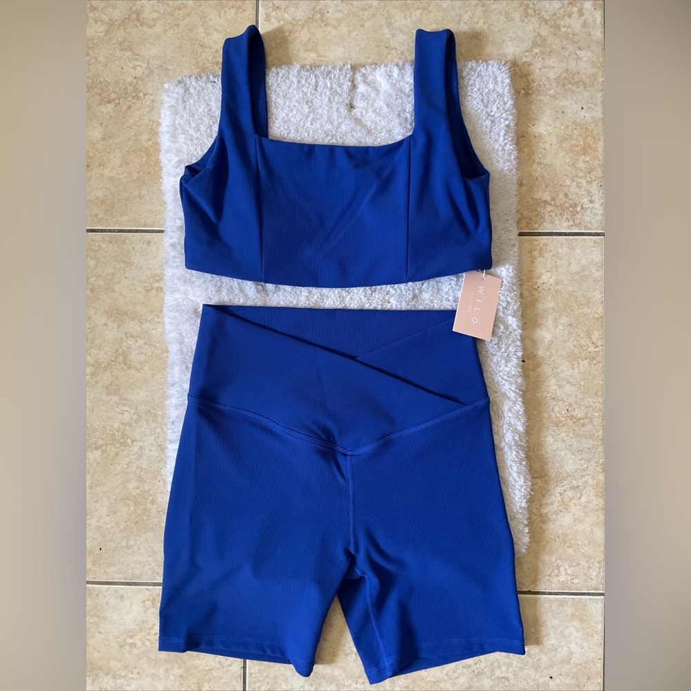 Women sports apparel bra and shorts set.